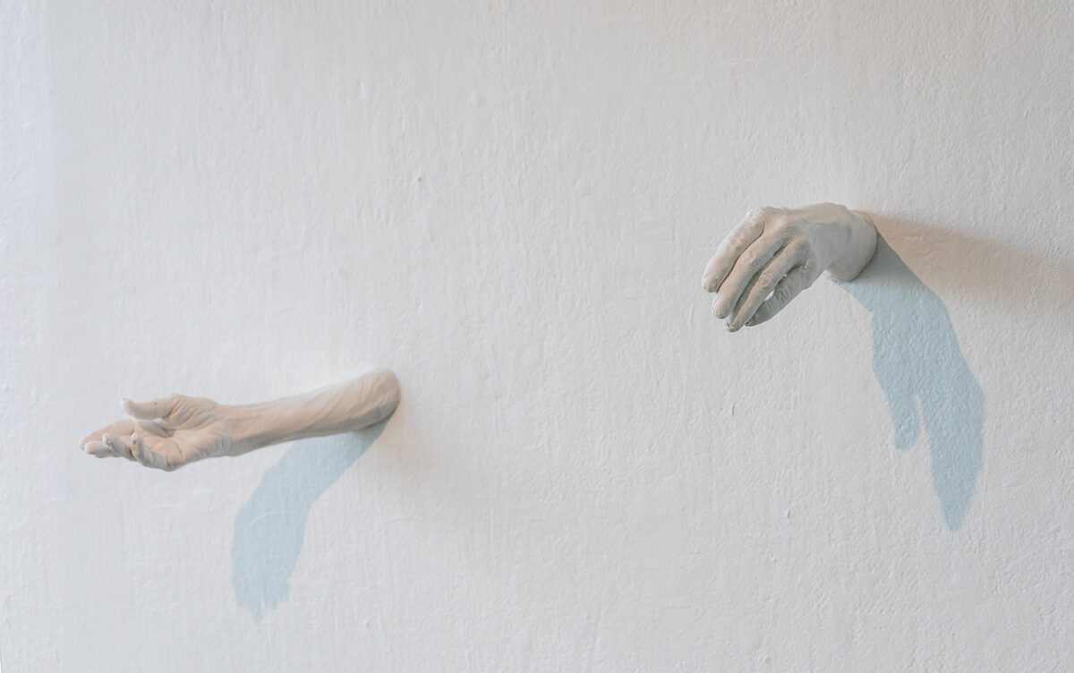 Field Casting (detail, two plaster casts of Professor Ilppo Vuorinen’s hands made using an alginate mould)